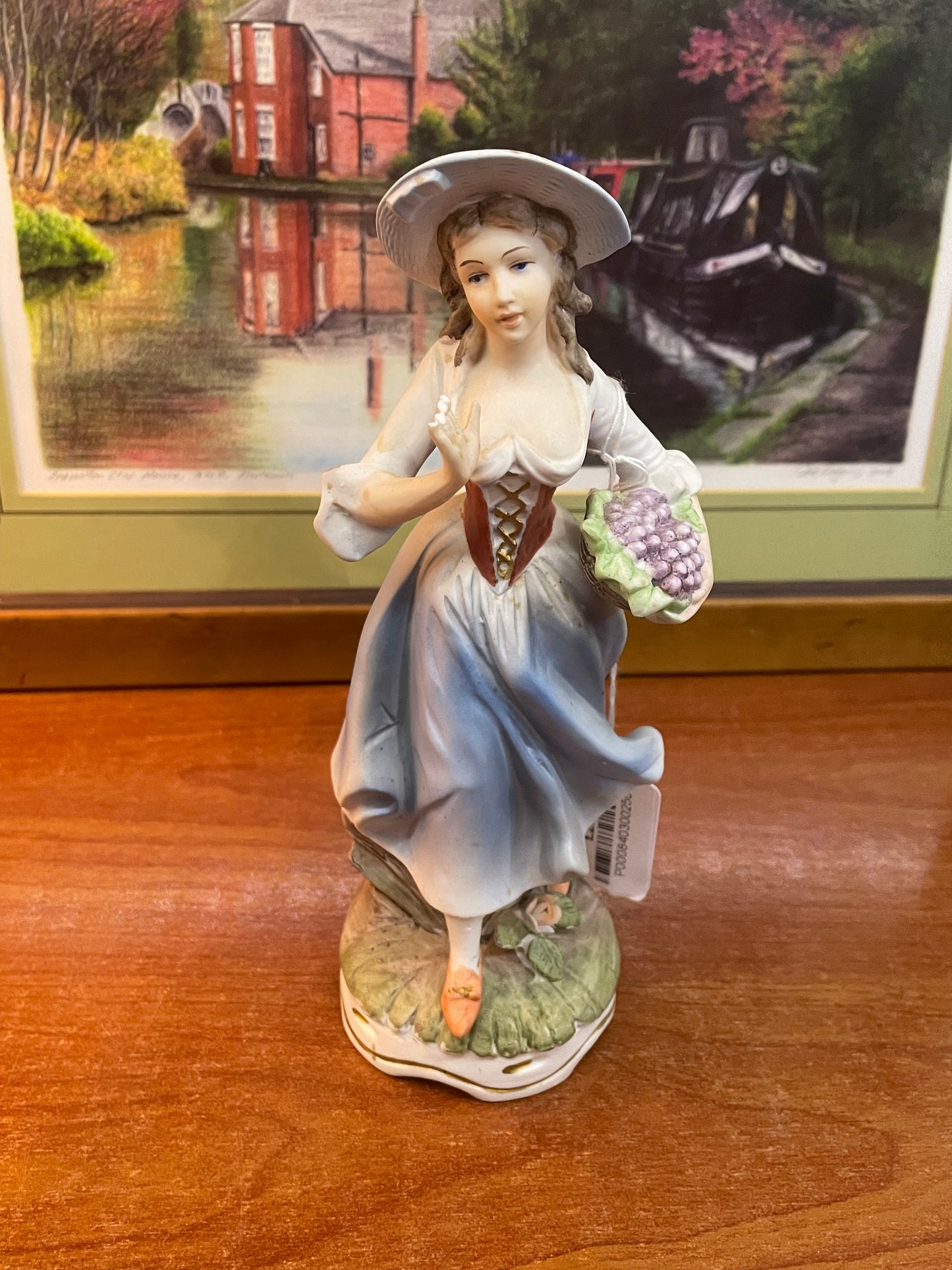 Pair of 2 porcelain “ flower basket “ dolls, England