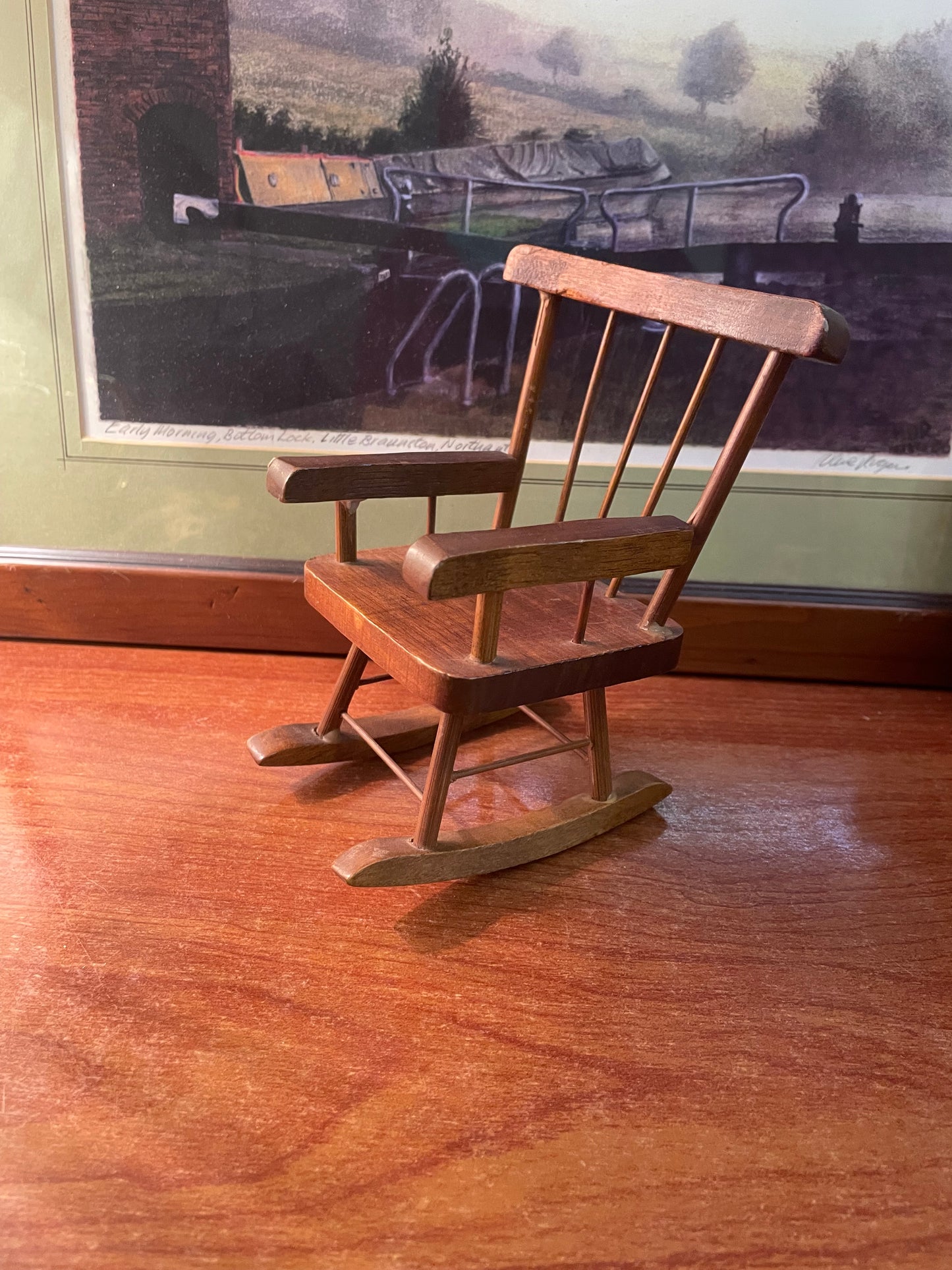 Antique wooden doll rocking chair