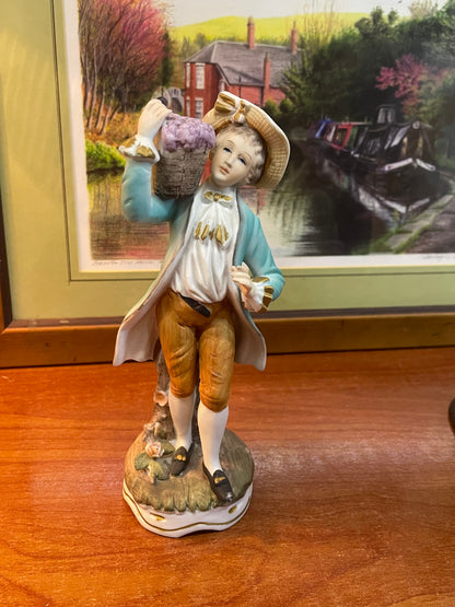 Pair of 2 porcelain “ flower basket “ dolls, England