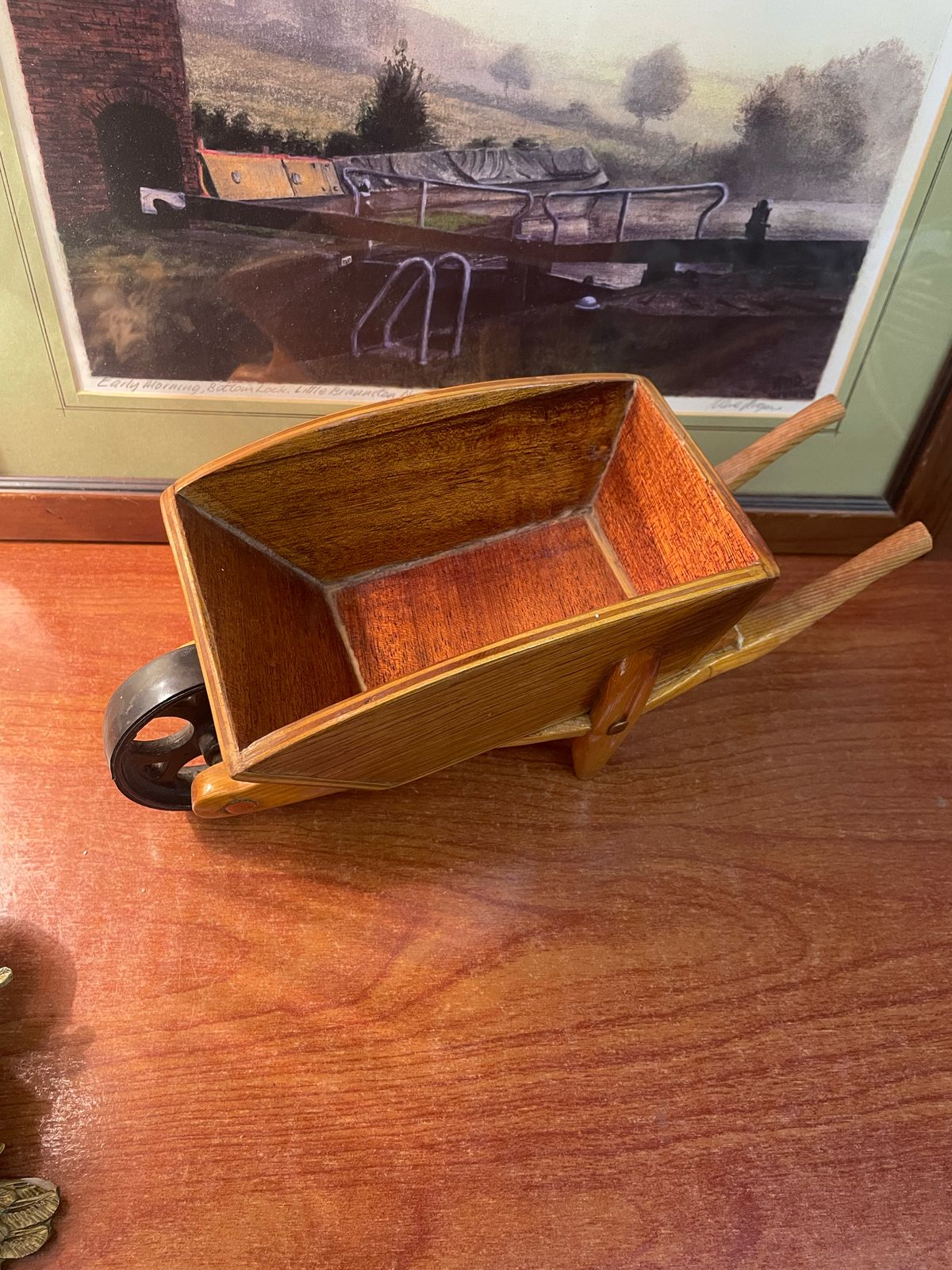 ARTISAN garden wheelbarrow.