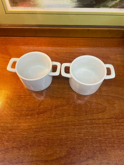 2 Small individual-serving-sized dishes commonly used for baking and serving.